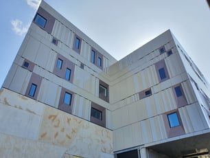 Compliant Facade Cladding